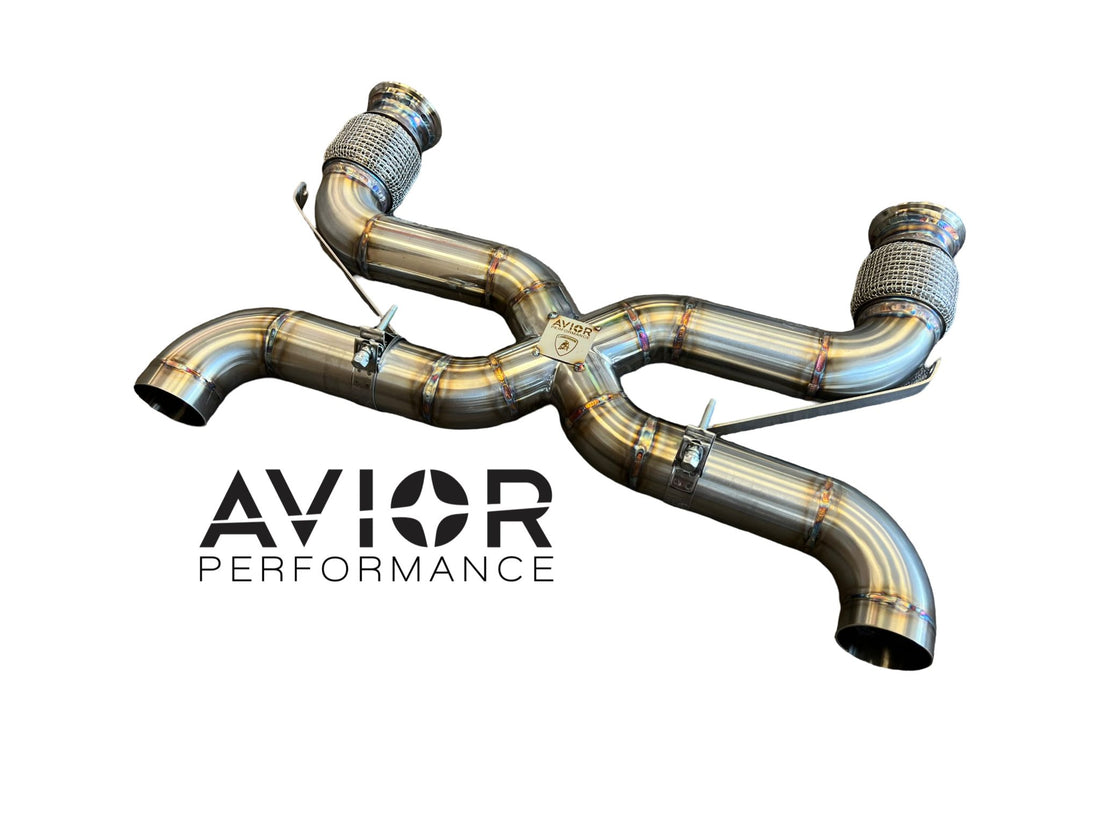 A performance exhaust system, featuring metallic pipes and components, with the AVIOR PERFORMANCE logo in the center.